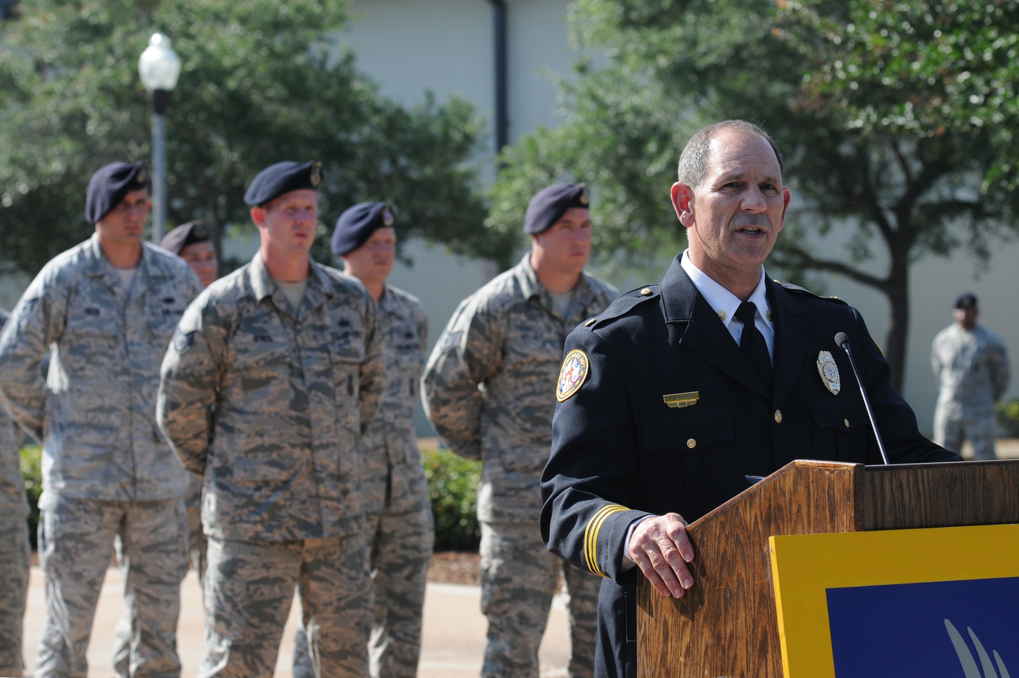Major Jim Adamo, Biloxi Police Department patrol commander, delivers remarks during the 81st Security Forces Squadron Retreat Ceremony May 19, 2016, Keesler Air Force Base, Miss. The ceremony was held during National Police Week, which recognizes the service of law enforcement men and women who put their lives at risk every day. (U.S. Air Force photo by Kemberly Groue)