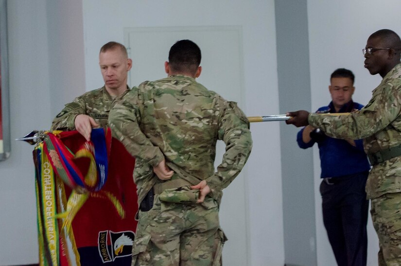 Col. Brett Sylvia, the commander of 2nd Brigade 101st Airborne Division (Air Assault), “Task Force Strike,” and Command Sgt. Maj. Jeremy Gebhardt, the senior noncommissioned officer for 2nd Battalion, 506th Infantry Regiment, 2nd BCT, uncase the Strike Brigade’s colors during their transfer of authority ceremony in Erbil, Iraq, May 17 2016. This ceremony marks the beginning of the Strike brigade’s deployment in Iraq as part of Combined Joint Forces Land Component Command – Operation Inherent Resolve, building partner capacity and advising and assisting Iraqi Security Forces. The building partner capacity mission aims to increase the military capacity of local forces fighting the Islamic State of Iraq and the Levant.
