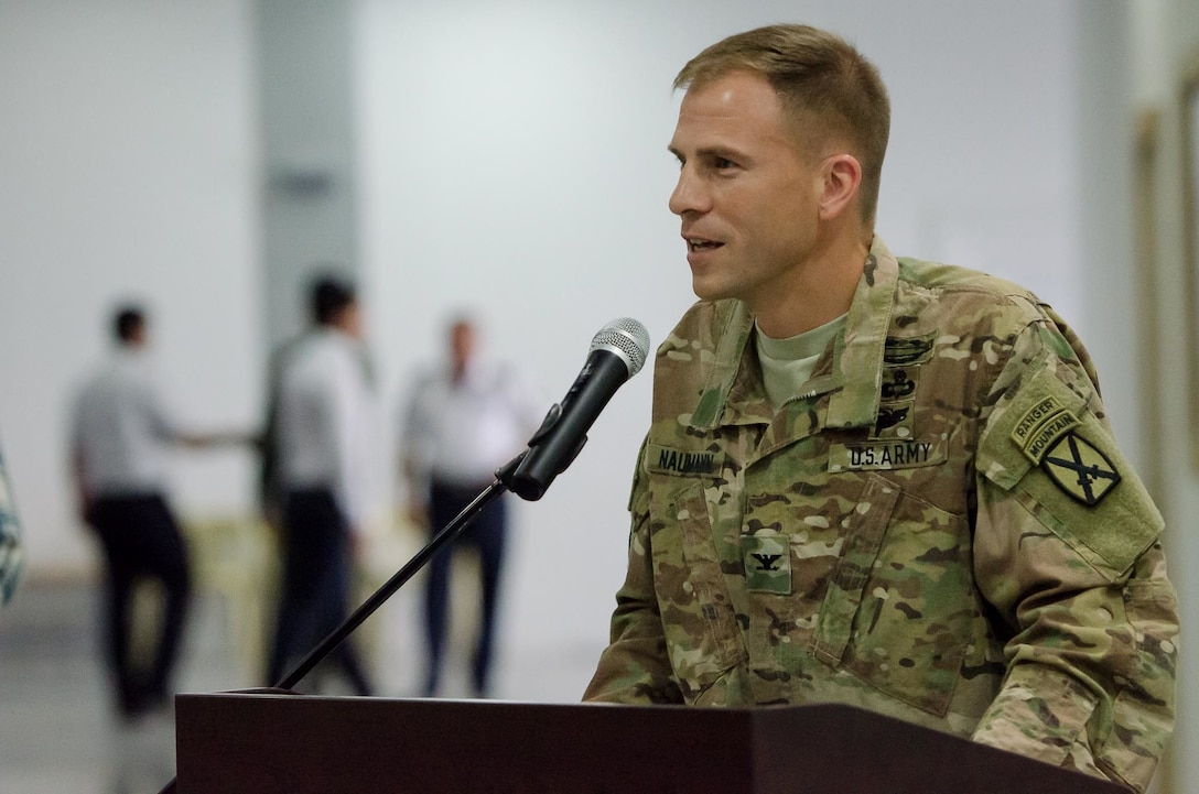 Col. Scott Naumann, commander of the 1st Brigade Combat Team, 10th Mountain Division, “Task Force Warrior,” speaks about the Warrior Brigade's accomplishments during a transfer of authority ceremony near Erbil, Iraq, May 17, 2016. The Warrior brigade completed a nine-month deployment in Iraq as part of Combined Joint Forces Land Component Command – Operation Inherent Resolve, building partner capacity, and advising and assisting Iraqi Security Forces.  The building partner capacity mission aims to increase the military capacity of local forces fighting the Islamic State of Iraq and the Levant.
