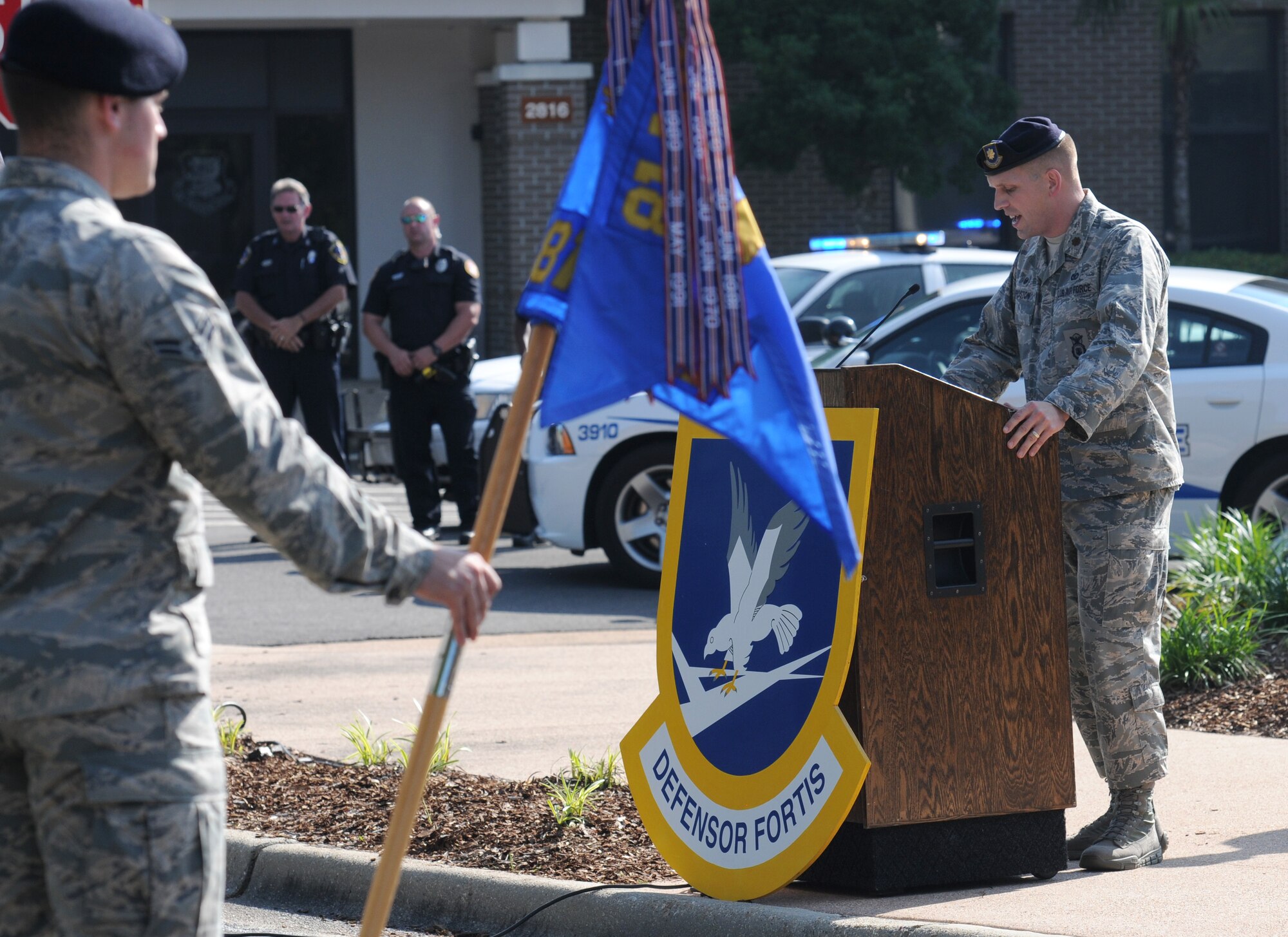 Maj. Devin Sproston, 81st Security Forces Squadron commander, delivers remarks during the 81st SFS Retreat Ceremony May 19, 2016, Keesler Air Force Base, Miss. The ceremony was held during National Police Week, which recognizes the service of law enforcement men and women who put their lives at risk every day. (U.S. Air Force photo by Kemberly Groue)