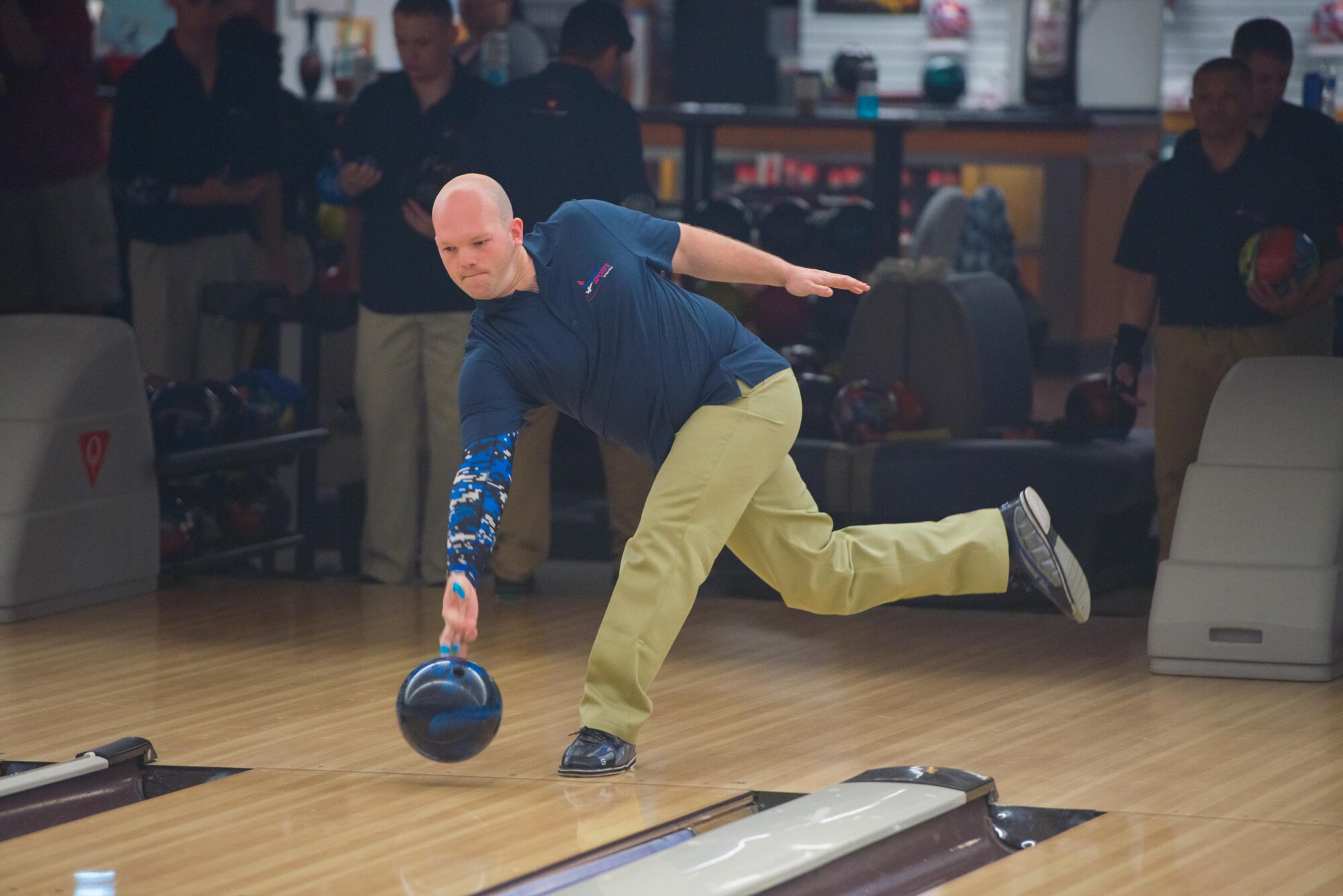 Technical Sergeant Kyle Wilkins, an RC-135 crew chief out of Offutt Air Force Base, Nebraska. warms up at the Armed Forces Bowling Championships at Travis Air Force Base, California (U.S. Air Foce Photo by Louis Briscese)