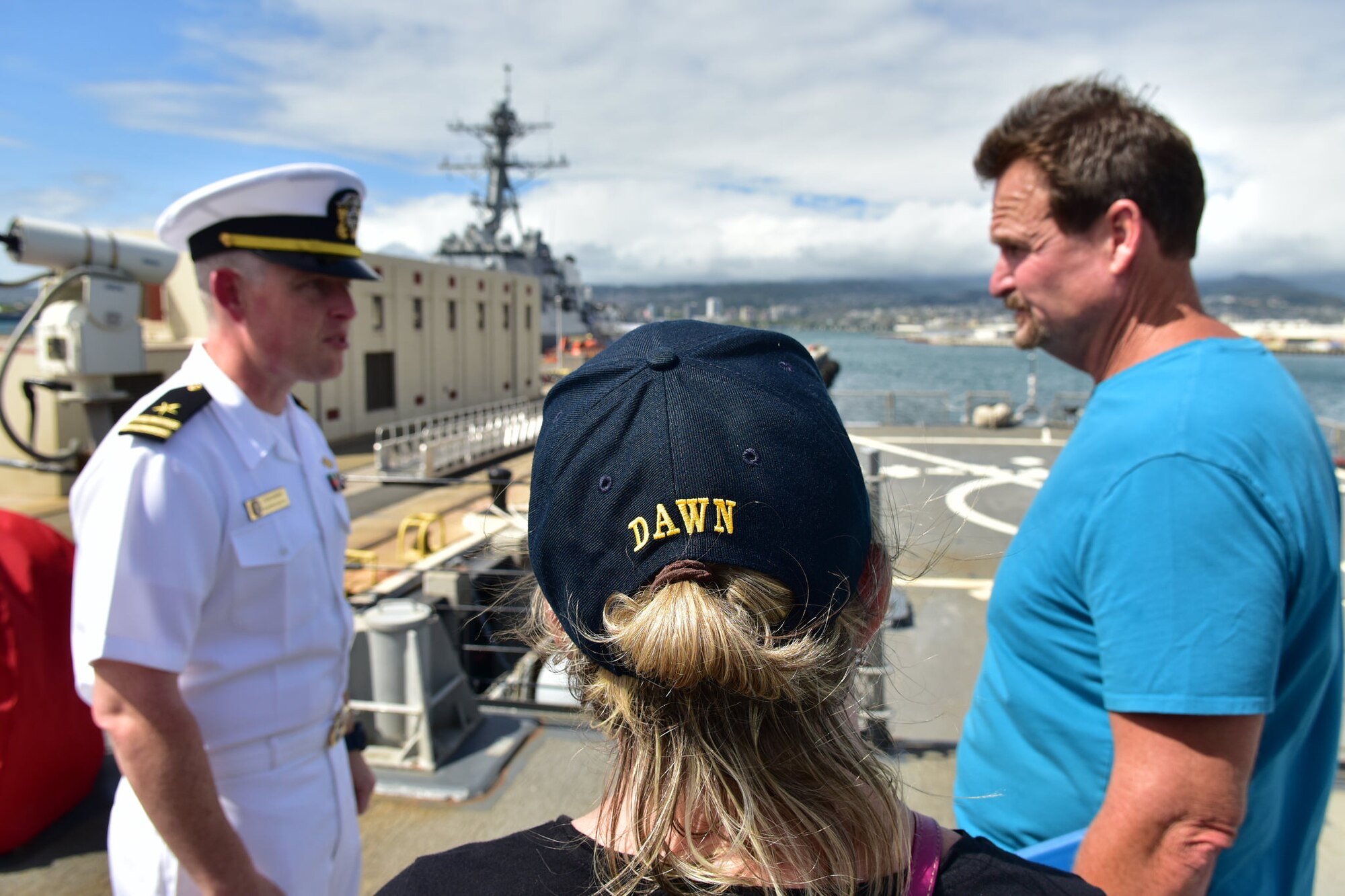 Dawn Harry, a former breast-cancer survivor from Huntington Beach, Calif., speaks to Lt. Robert Carlson during a visit to the USS Hopper, May 10, 2016. Dawn’s visit to Hawaii and JBPHH is part of the Dream Foundation, which is a program that grants wishes to adults who are terminally ill. (Air Force photo by Staff Sgt. Christopher Stoltz/Released)