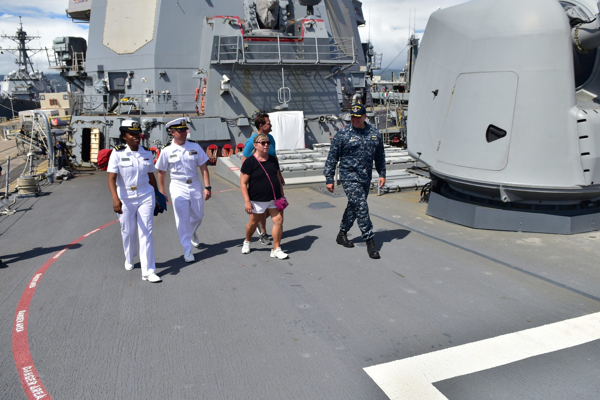 USS Hopper Commanding Officer CDR J.D. Gainey, LT Robert Clarkson and ENS Kiara King escort Dawn Harry during her tour on May 10, 2016. Dawn’s visit to Hawaii and JBPHH is part of the Dream Foundation, which is a program that grants wishes to adults who are terminally ill. (Air Force photo by Staff Sgt. Christopher Stoltz/Released)