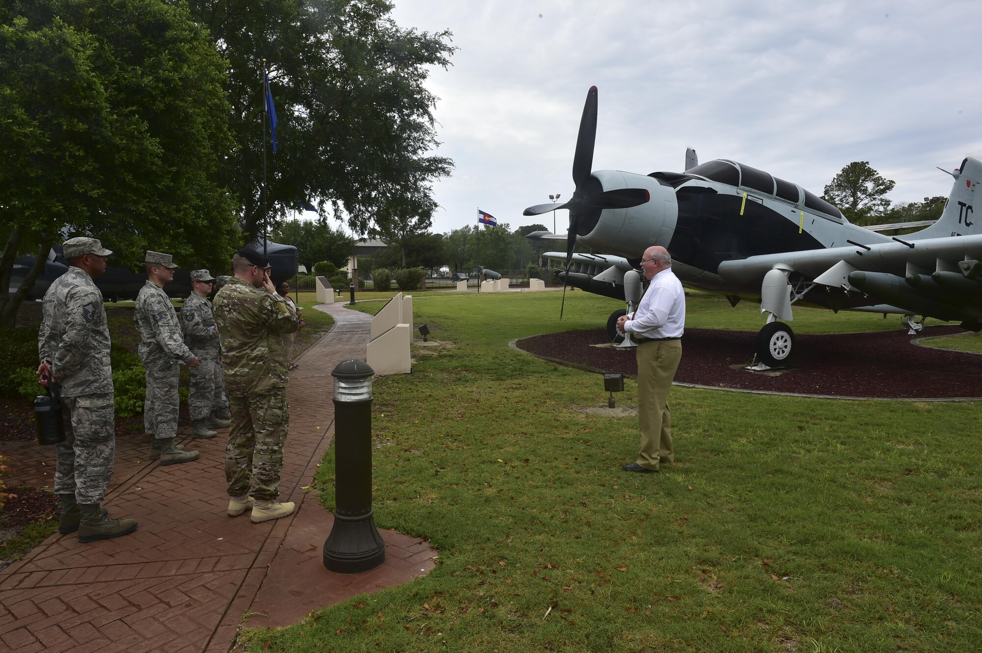 Todd Schroeder, Air Force Special Operations Command History, guides the AFSOC annual award winners on a May 18 tour of the Hurlburt Field Air Park. The award winners visited AFSOC facilities and units for two days prior to the formal banquet held May 19 here. (U.S. Air Force photo by Senior Airman Jeff Parkinson)