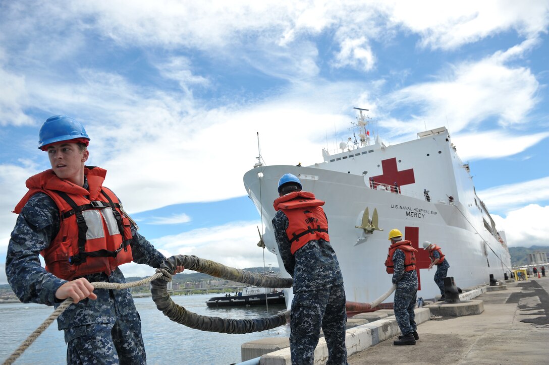 Sailors assigned handle the line as the hospital ship USNS Mercy moors at Joint Base Pearl Harbor-Hickam, May 18, 2016. The Mercy is deployed in support of Pacific Partnership 2016. Navy photo by Petty Officer 2nd Class Johans Chavarro