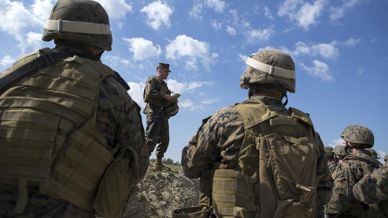 1st Lt. Jonathan Stinson, platoon commander of Company D, 4th Law Enforcement Battalion, Force Headquarters Group, Marine Forces Reserve, briefs his Marines before training during exercise Platinum Wolf 2016 at Peacekeeping Operations Training Center South Base, Bujanovac, Serbia, May 118, 2016. The Marines are working with the partner nations of Bosnia, Bulgaria, Macedonia, Montenegro, Slovenia and Serbia to hone their skills in peacekeeping operations and non-lethal weapons systems. The partner nations are also focusing on sharing new tactics and techniques to improve their ability to work together.