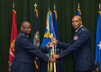 Maj. Gen. Mark Brown, 2nd Air Force commander, passes the guidon to Col. Roy Collins, incoming 37th Training Wing commander, during the 37th TRW change of command ceremony May 20, 2016, at the Gateway Club at Joint Base San Antonio-Lackland, Texas. Collins comes to JBSA-Lackland from Minot Air Force Base, N.D., where he was the 5th Bomb Wing Mission Support Group commander.

