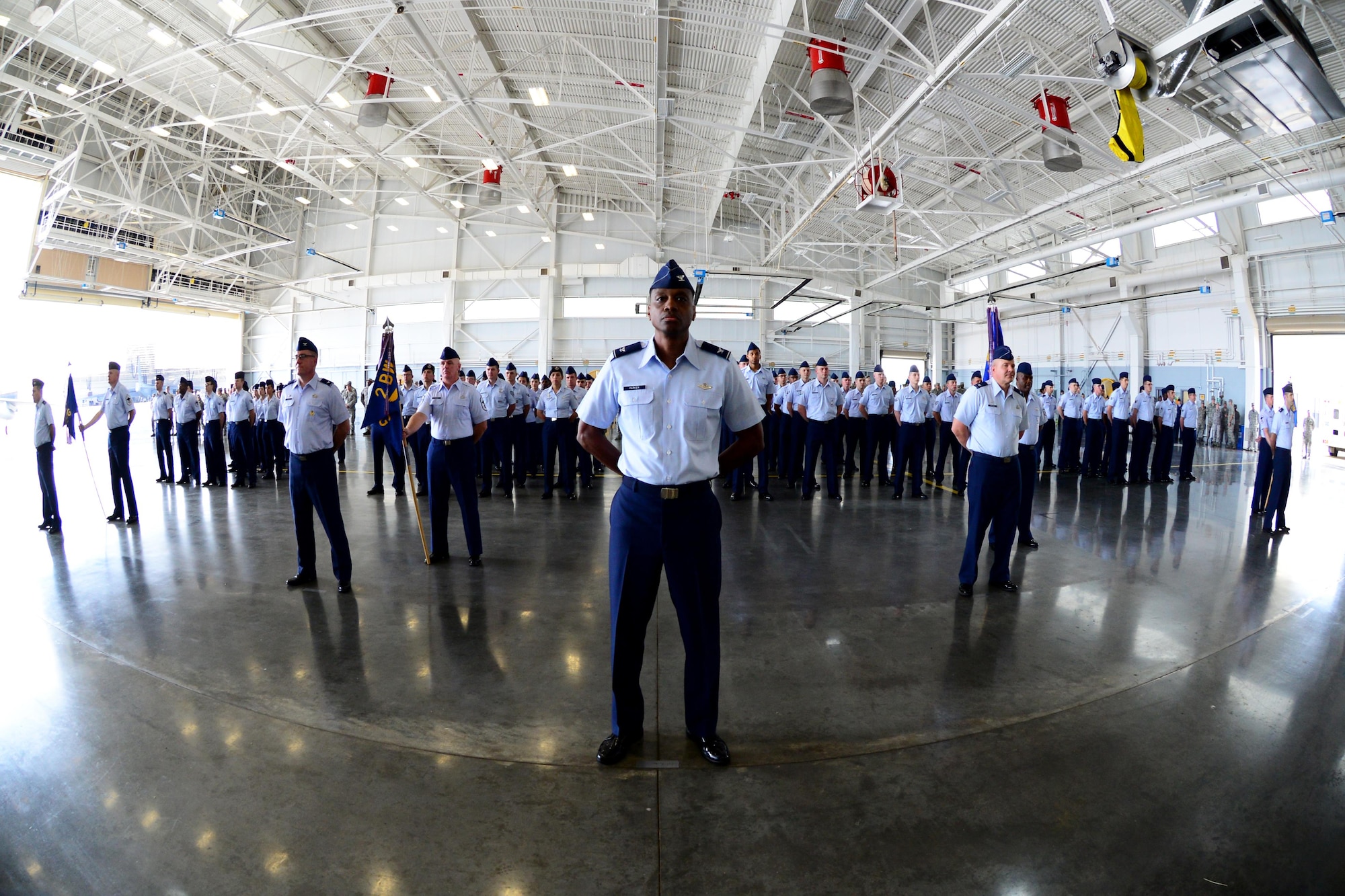 Col. Brandon Parker, 2nd Bomb Wing vice commander, puts his flight at ease during the 2nd Bomb Wing change of command ceremony at Barksdale Air Force Base, La., May 20, 2016. Leadership of the wing was transferred from Col. Kristin Goodwin to Col. Ty Neuman during the ceremony, which was presided over by Maj. Gen. Richard Clark, 8th Air Force commander. (U.S. Air Force photo/Senior Airman Luke Hill)