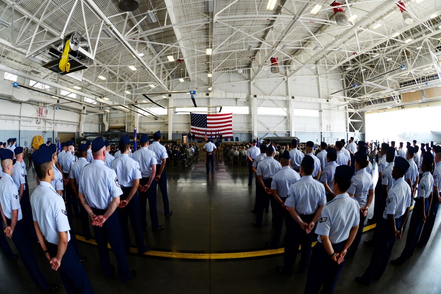 Airmen of the 2nd Bomb Wing stand at ease in formation during the 2nd BW change of command ceremony at Barksdale Air Force Base, La., May 20, 2016. Col. Ty Neuman assumed command of the “Mighty Deuce” from Col. Kristin Goodwin during the ceremony. (U.S. Air Force photo/Senior Airman Luke Hill)
