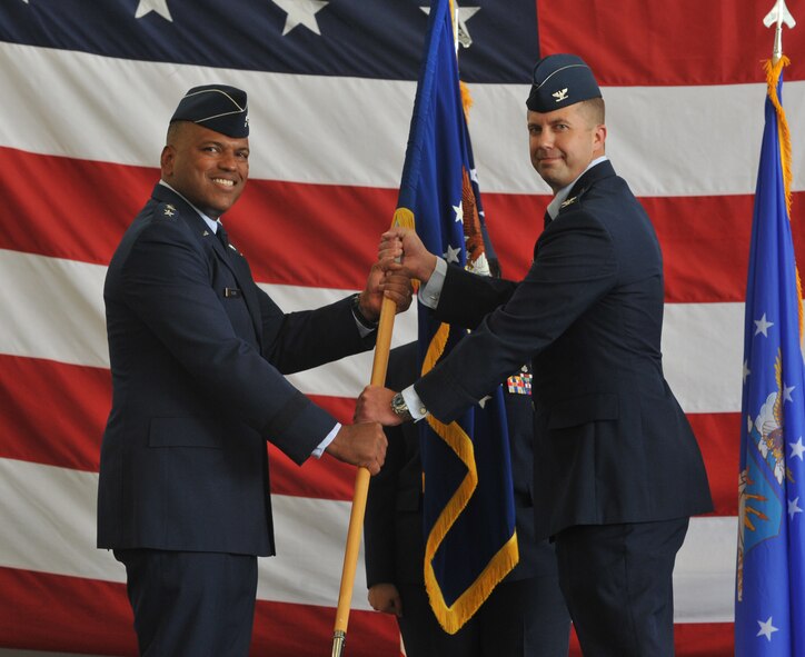 Col. Ty Neuman assumes command of the 2nd Bomb Wing during a change of command ceremony at Barksdale Air Force Base, La., May 20, 2016. As commander, he will support 32 tenant units, including headquarters Air Force Global Strike Command, headquarters 8th Air Force and Air Force Reserve Command's 307th Bomb Wing. (U.S. Air Force photo/Senior Airman Joseph Raatz)