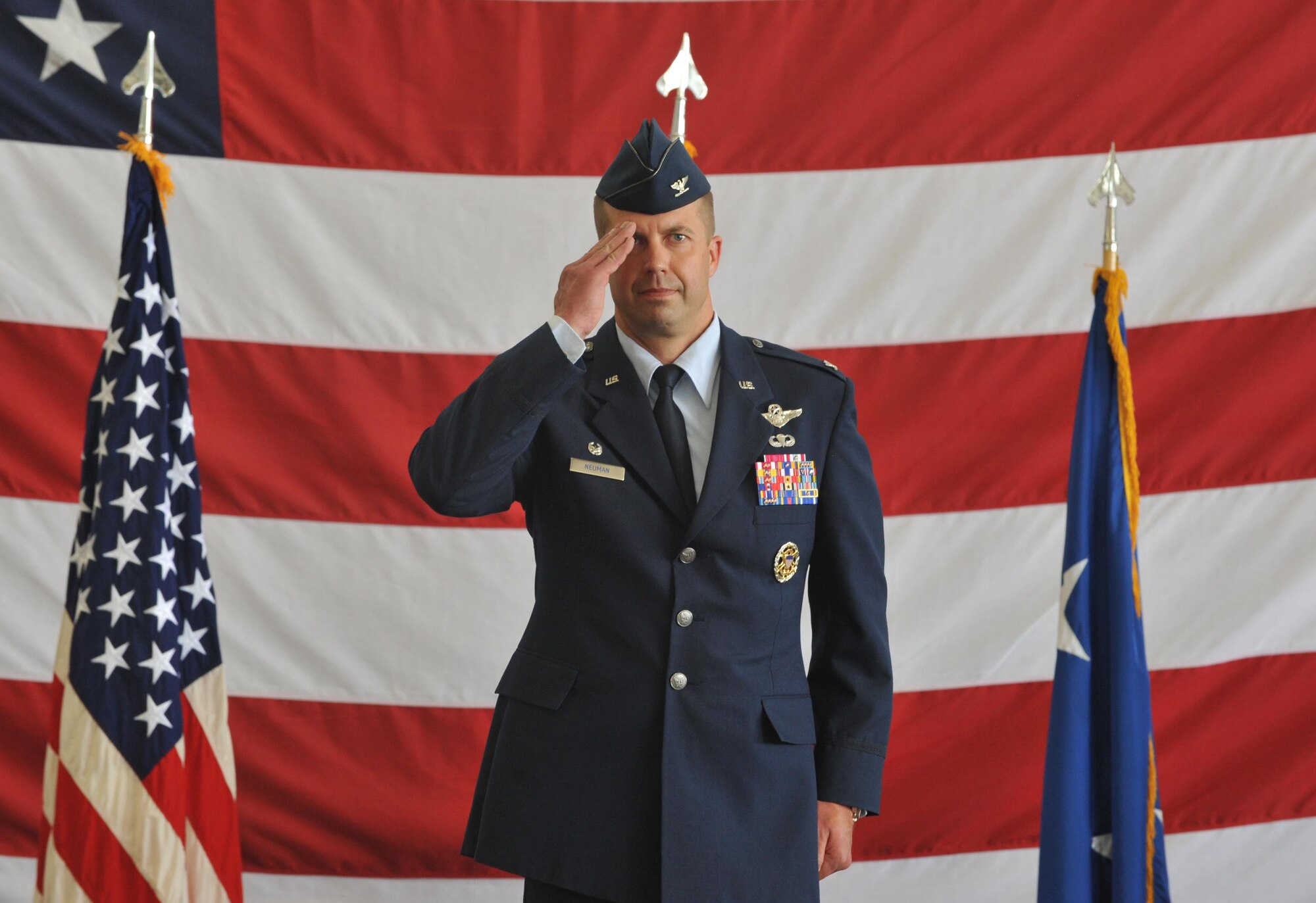 Col. Ty Neuman, 2nd Bomb Wing commander, renders his first salute to his new Airmen during a change of command ceremony at Barksdale Air Force Base, La., May 20, 2016. As commander, he will support 32 tenant units, including headquarters Air Force Global Strike Command, headquarters 8th Air Force and Air Force Reserve Command's 307th Bomb Wing. (U.S. Air Force photo/Senior Airman Joseph Raatz)