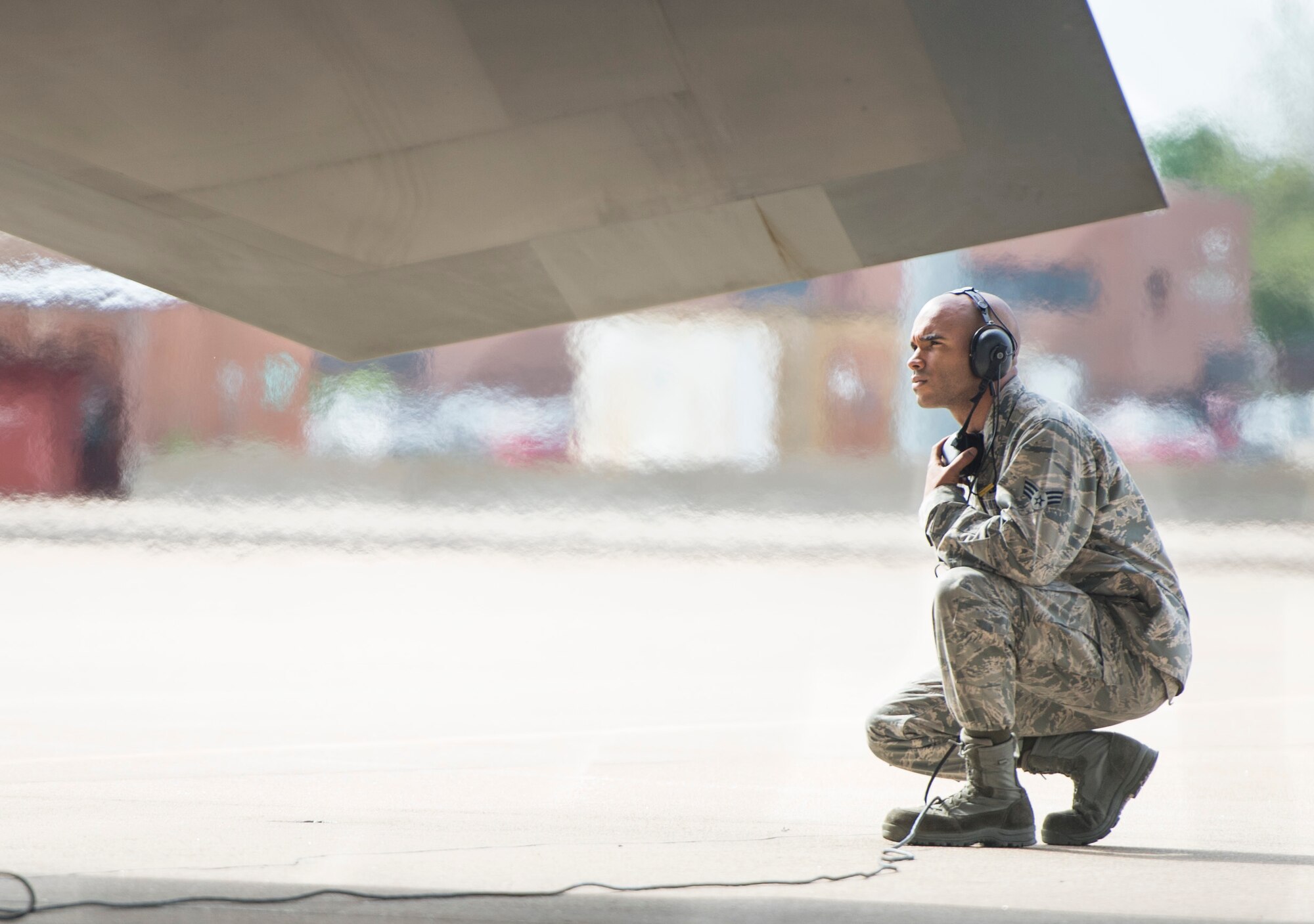 U.S. Air Force Senior Airman Ismael Debarros, an F-22 Raptor crew chief assigned to the 94th Aircraft Maintenance Unit, inspects a Raptor prior to departure at Langley Air Force Base, Va., May 19, 2016. Personnel from the 94th AMU, 94th Fighter Squadron, 1st Maintenance Group, 1st Fighter Wing and mission support partners from the 733rd Logistics Readiness Squadron joined together to get approximately 200 Airmen and 15 Raptors to Joint Base Elmendorf-Richardson, Alaska. (U.S. Air Force photo by Senior Airman Kayla Newman)
