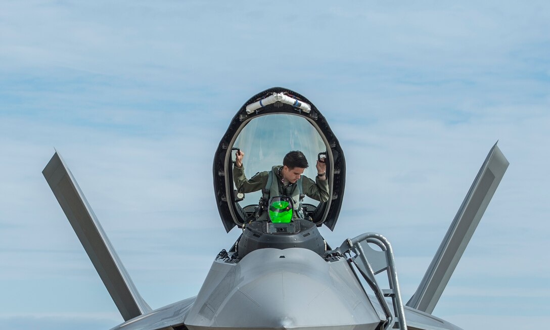A U.S. Air Force pilot assigned to the 94th Fighter Squadron enters an F-22 Raptor at Langley Air Force Base, Va., May 19, 2016. Approximately 15 Raptors deployed to Joint Base Elmendorf-Richardson, Alaska, to participate in exercise Red Flag-Alaska 16-2 and Distant Frontier. (U.S. Air Force photo by Senior Airman Kayla Newman)
