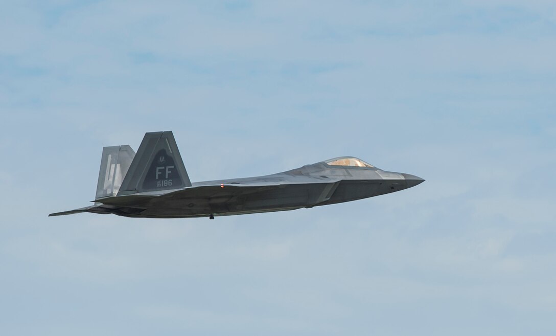 An F-22 Raptor takes off from Langley Air Force Base, Va., May 19, 2016. The Raptor was one of several 94th Fighter Squadron aircraft heading to Joint Base Elmendorf-Richardson, Alaska, to participate in a Pacific Air Forces-sponsored, Joint National Training Capability accredited exercise, Red Flag-Alaska 16-2. (U.S. Air Force photo by Senior Airman Kayla Newman)