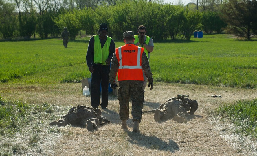 Airmen from the 791st Missile Security Forces Squadron Bravo Flight low crawl during training at Minot Air Force Base, N.D., May 16, 2016. Tactical skills training is part of the annual required training for security forces members. (U.S. Air Force photo/Senior Airman Apryl Hall)