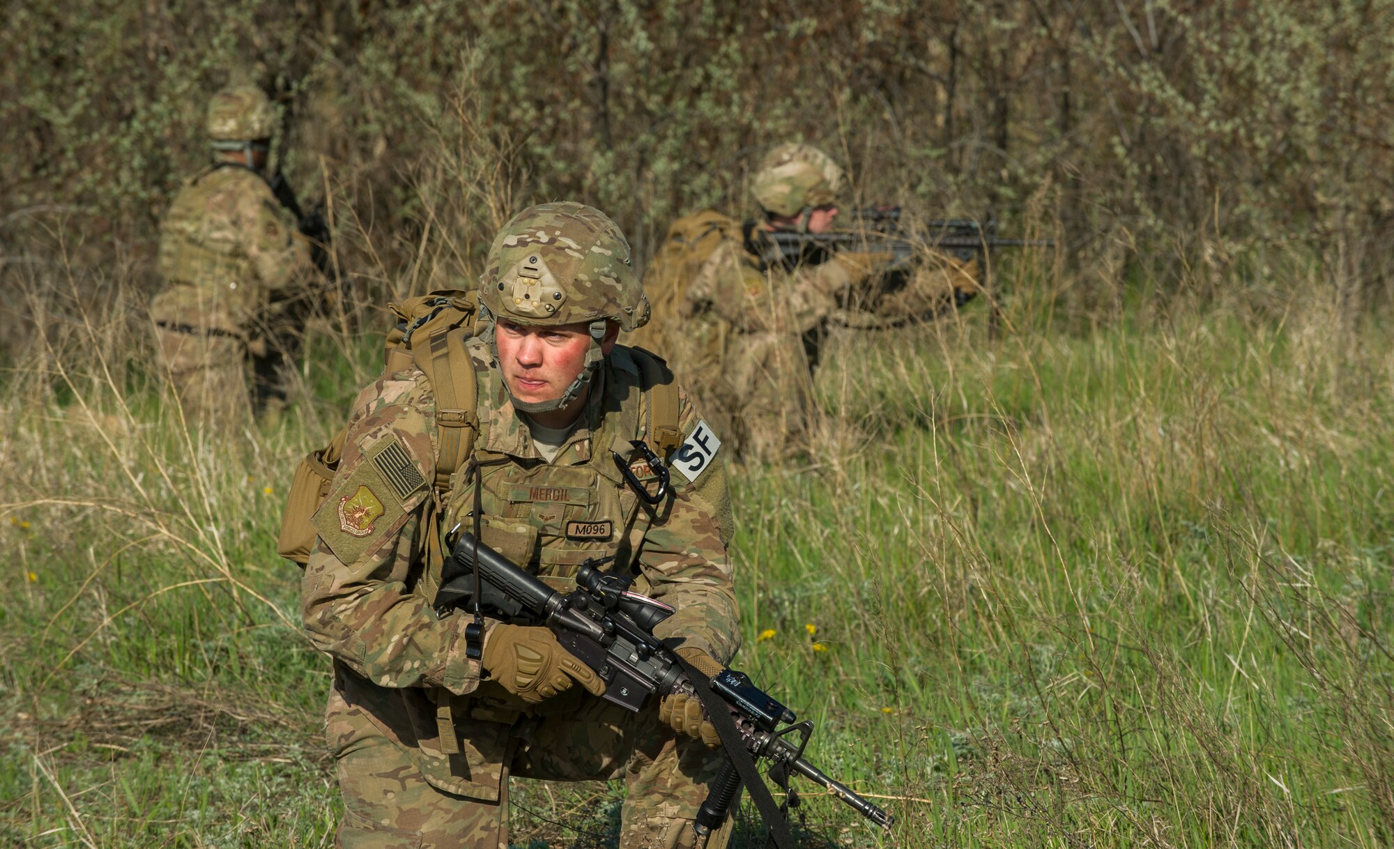 Airman 1st Class Ethan Mercil, 791st Missile Security Forces Squadron defender, pulls security during an exercise at Minot Air Force Base, N.D., May 16, 2016. The training incorporated tactical skills with a force-on-force exercise. (U.S. Air Force photo/Senior Airman Apryl Hall)