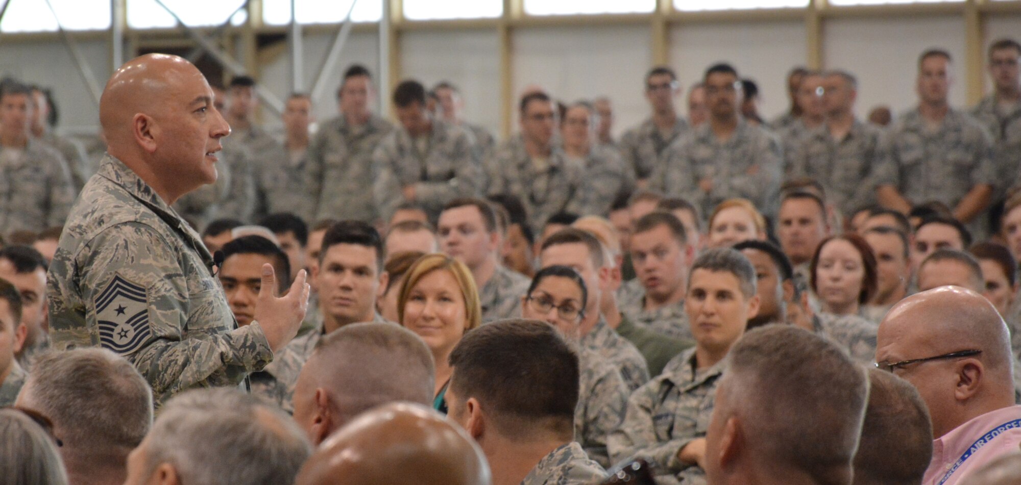 Chief Master Sgt. Jose Barraza, Command Chief Master Sergeant, 12th Air Force (Air Forces Southern), participates in a commander’s call with Airmen from the 552nd Air Control Wing on May 12 in Bldg. 230, Dock 2 at Tinker Air Force Base. (Air Force photo by Darren D. Heusel/Released)