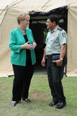Nicaraguan Army Col. Rogelio Enrique Flores Ortíz, head of the Nicaraguan Civil Defense, converses about future collaboration opportunities with Laura F. Doğu, Ambassador of the United States to Nicaragua, after the Joint Task Force-Bravo U.S. Southern Command Situational Assessment Team element, based out of Soto Cano Air Base, Honduras, provided a mission and capabilities brief and as well as an orientation to S-SAT equipment May 17, 2016, Managua, Nicaragua. (U.S. Air Force Photo by Capt. David Liapis)