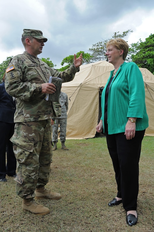 U.S. Army Lt. Col. Brian Henderson, Joint Task Force-Bravo U.S. Southern Command Situational Assessment Team and U.S. Army Forces Battalion commander, discusses with Laura F. Doğu, Ambassador of the United States to Nicaragua, some of the capabilities of the S-SAT, which is a scalable element comprised of a team leader, civil military operations officer, air operations planer, engineer operations planner, logistics planner, communications planner, medical planner and force protection planner who provide critical information to governmental disaster response teams so they know what to expect and plan for when they arrive, May 17, 2016, Managua, Nicaragua. The JTF-Bravo S-SAT was invited to Nicaragua to demonstrate their ability to respond to a disaster situation and integrate with the U.S. Embassy, Managua, Community Emergency Response Team and the Nicaraguan National System for Prevention the Office of U.S. Foreign Disaster Assistance, which is part of US AID, and Attention to Disasters (SINAPRED) to aid in the response and alleviate human suffering. (U.S. Air Force Photo by Capt. David Liapis)