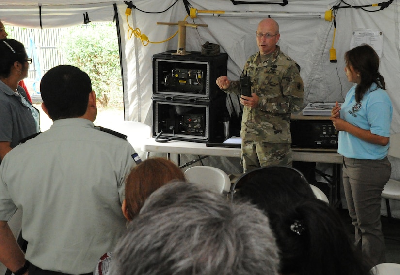 U.S. Army Staff Sgt. Jayson Toohey, Joint Task Force-Bravo communications officer, describes his role in the self-sufficient capabilities of the nine-person U.S. Southern Command Situational Assessment Team that was invited to demonstrate their disaster response assistance capabilities to the Nicaraguan Civil Defense and U.S. Embassy, Managua, Community Emergency Response Team May 17, 2016 in Managua, Nicaragua. The S-SAT is comprised of a team leader, civil military operations officer, air operations planer, engineer operations planner, logistics planner, communications planner, medical planner and force protection planner who provide critical information to governmental disaster response teams so they know what to expect and plan for when they arrive. (U.S. Air Force Photo by Capt. David Liapis)