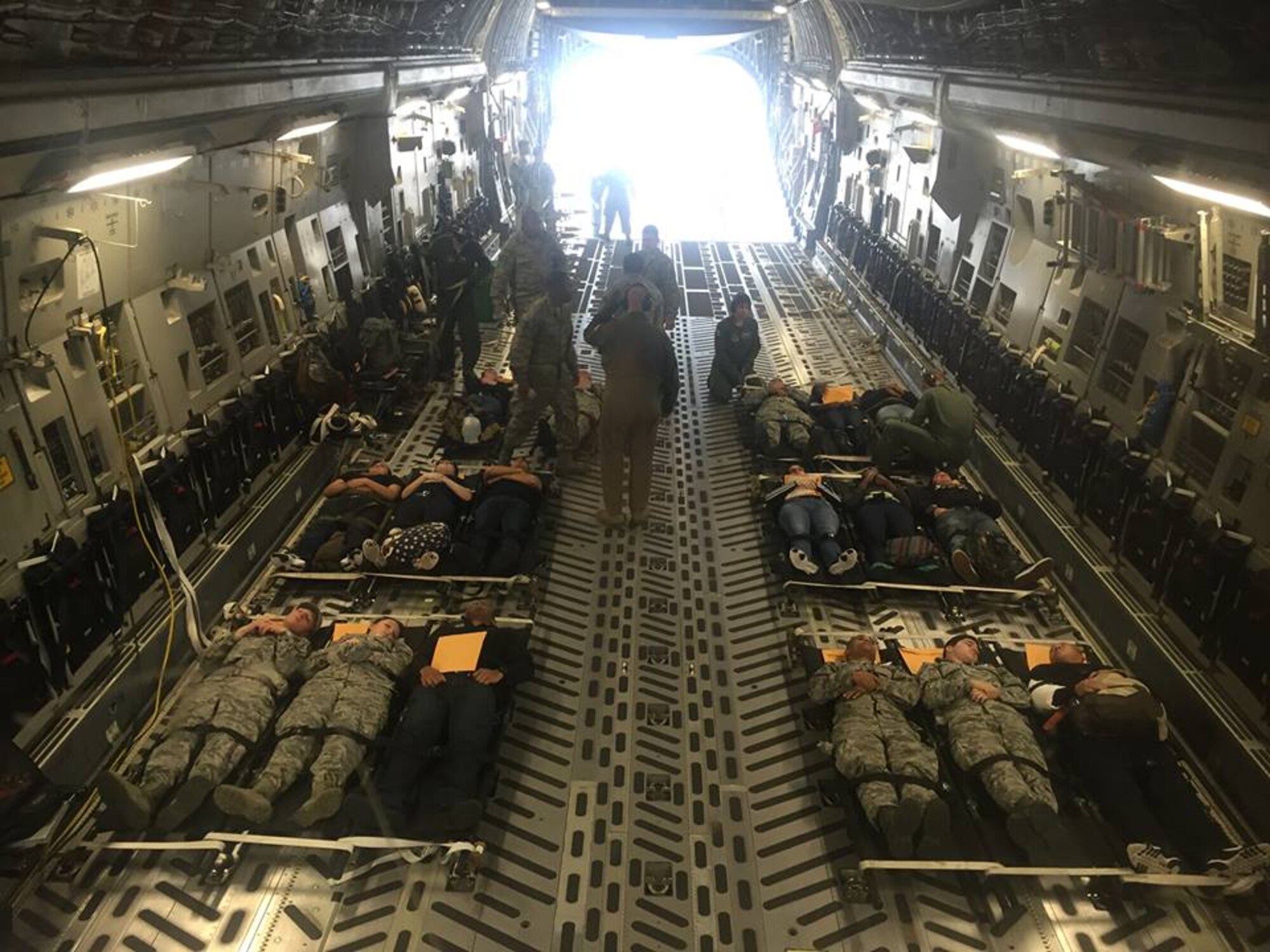 Simulated patients lay on gurneys in a C-17 Globemaster III aircraft, operated by the 167th Airlift Wing, during a disaster response exercise, at Naval Air Station-Joint Reserve Base New Orleans, La., April 14-16. The exercise was in conjunction with the nationwide Vigilant Guard exercise. (U.S. Air National Guard photo by Capt. Sam Harrison/released)
