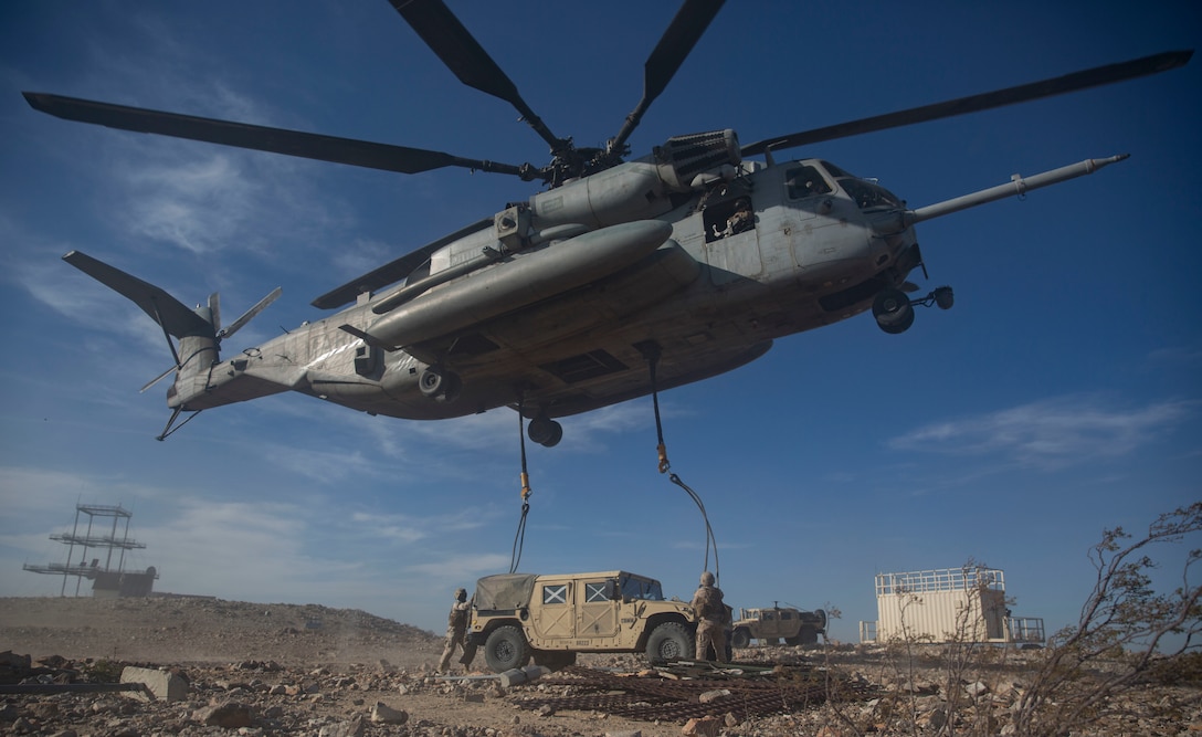 U.S Marines with 2nd Transportation Support Battalion (TSB),  anchor ropes to a Humvee durring the Integrated training exercise (ITX) onTwentynine Palms, Ca., May. 13, 2016. 2nd TSB and subordinate units participated in ITX 3-16 to ensure all elements of Special-Purpose Marine Air Ground Task Force 2 are prepared for upcoming deployments and operational commitments.