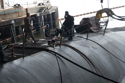 Marine Corps Gen. Joe Dunford, chairman of the Joint Chiefs of Staff, talks with sailors working on the USS Alaska at Naval Submarine Base Kings Bay, Ga., May 20, 2016. DoD photo by D. Myles Cullen