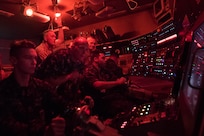 Marine Corps Gen. Joe Dunford, second from left, chairman of the Joint Chiefs of Staff, and Army Command Sgt. Maj. John W. Troxell, fourth from left, the chairman's senior enlisted advisor, receive a submarine training demonstration from students at the Trident Training Facility at Naval Submarine Base Kings Bay, Ga., May 20, 2016. DoD photo by D. Myles Cullen