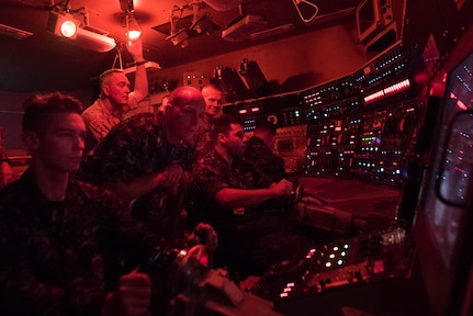 Marine Corps Gen. Joe Dunford, second from left, chairman of the Joint Chiefs of Staff, and Army Command Sgt. Maj. John W. Troxell, fourth from left, the chairman's senior enlisted advisor, receive a submarine training demonstration from students at the Trident Training Facility at Naval Submarine Base Kings Bay, Ga., May 20, 2016. DoD photo by D. Myles Cullen