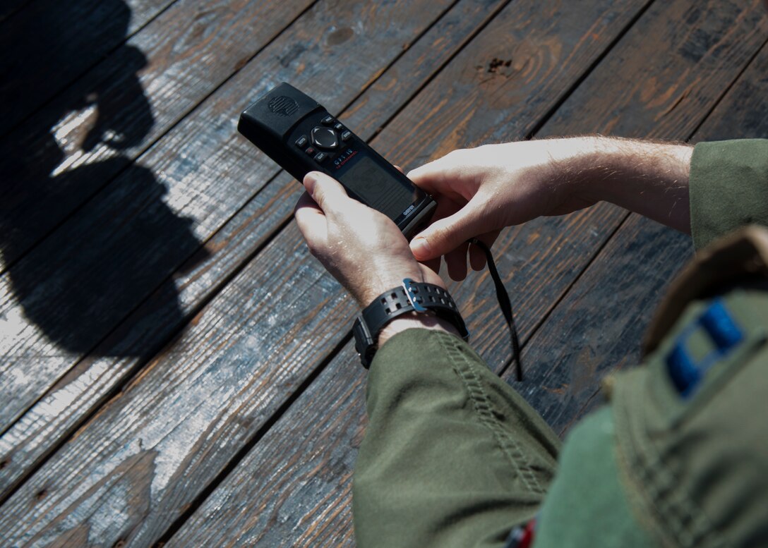 Aircrew use GPS devices for land navigation during a combat survival course training Feb. 18, 2016 in Abilene, Texas. Aircrew must use navigation skills and techniques to make their way from point A to point B without being detected and caught by the adversary. (U.S. Air Force photo by Airman 1st Class Katherine Miller/Released)