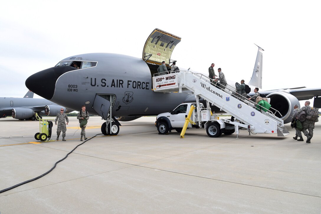 Airmen from the 108th Wing board a KC-135 at Joint Base McGuire-Dix-Lakehurst, N.J., en route to Guam in support of air refueling missions in the Pacific region, April 28, 2016. (U.S. Air National Guard photo by Airman 1st Class Julia Pyun/Released)