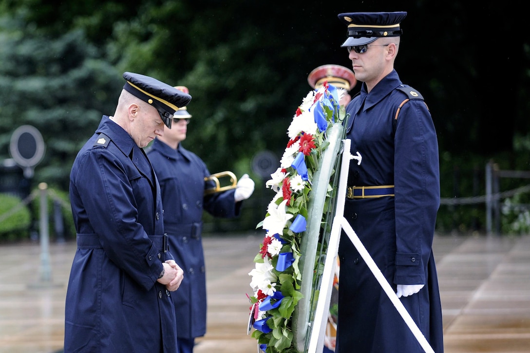 Army Command Sgt. Maj. John W. Troxell, left, senior enlisted advisor to the chairman of the Joint Chiefs of Staff, pays respects at the Tomb of the Unknown Soldier to honor National Armed Forces Day in Arlington National Cemetery, Arlington, Va., May 21, 2016. DoD photo by Marvin D. Lynchard