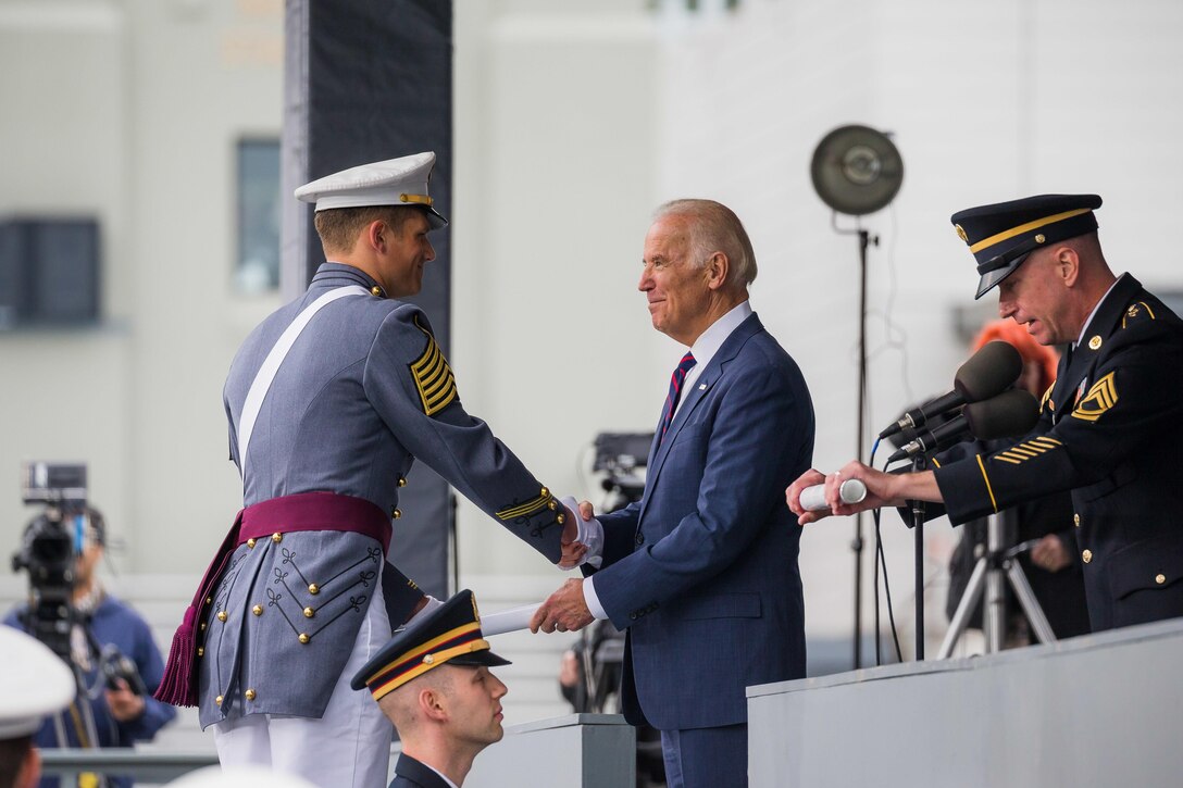 Vice President Joe Biden shakes hands with a Class of 2016 cadet during the commencement ceremony at the U.S. Military Academy in West Point, N.Y., May 21, 2016. Army photo by Staff Sgt. Vito T. Bryant