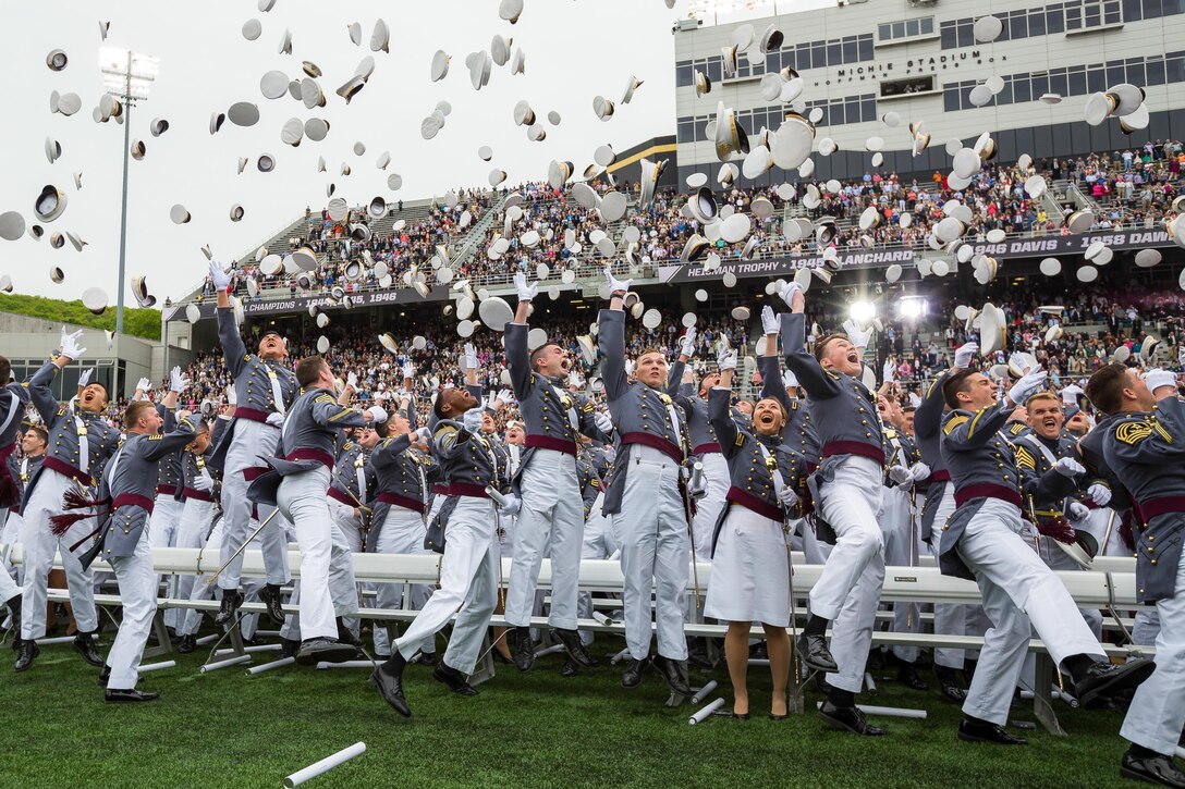 Newly commissioned second lieutenants participate in the traditional hat toss at the end of the 2016 commencement ceremony at the U.S. Military Academy in West Point, N.Y., May 21, 2016. Army photo by Staff Sgt. Vito T. Bryant