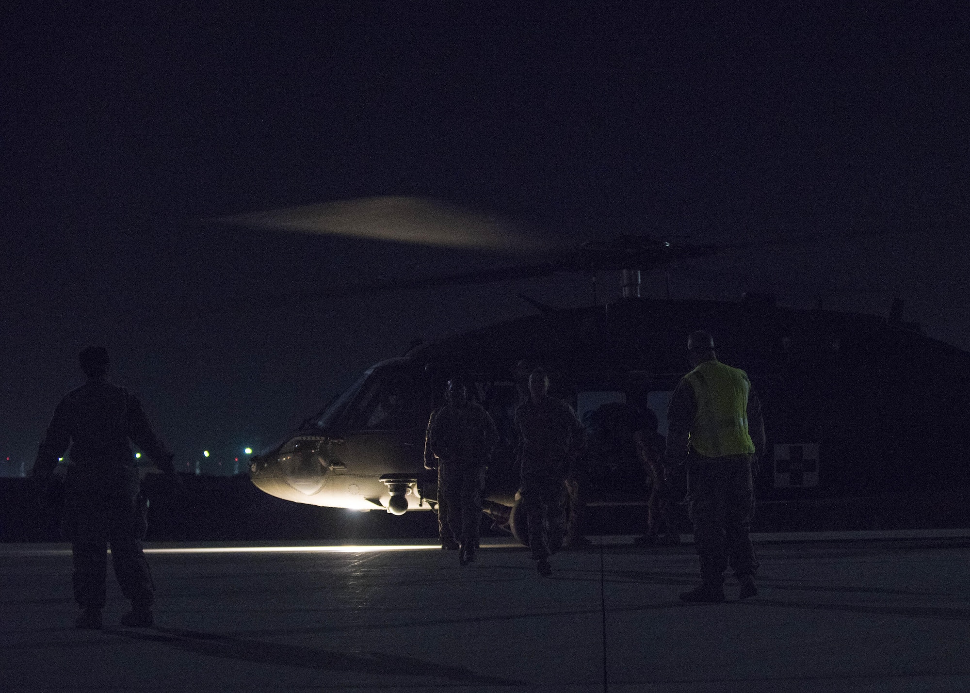 The 455th Expeditionary Medical Group teams up with the U.S. Army "Dustoff" Medical Evacuation Unit during a mass casualty exercise at Bagram Airfield, Afghanistan, May 21, 2016. Members of the 455th EMDG followed a fictitious storyline, but the exercise called for the employment of real-world assets. (U.S. Air Force photo by Senior Airman Justyn M. Freeman)