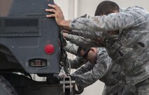 Security forces members participate in a pushup challenge during the Battle of the Badges competition May 19, 2016, at Ramstein Air Base, Germany. The competition was part of events held for National Police Week, which pays special recognition to those law enforcement officers who have lost their lives in the line of duty. (U.S. Air Force photo/Senior Airman Damon Kasberg)