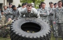 Security forces members participate in a pushup challenge during the Battle of the Badges competition May 19, 2016, at Ramstein Air Base, Germany. The competition was part of events held for National Police Week, which pays special recognition to those law enforcement officers who have lost their lives in the line of duty. (U.S. Air Force photo/Senior Airman Damon Kasberg)