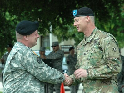 Brig. Gen. David Elwell, Commanding General, 311th Sustainment Command (Expeditionary), welcomes Col. Jon Blatt to his new command at the 304th Sustainment Brigade, March Air Reserve Base, Riverside, Calif., May 15, 2016. (Photo courtesy of Staff Sgt. Ailid Beckstrom, 304th SB)