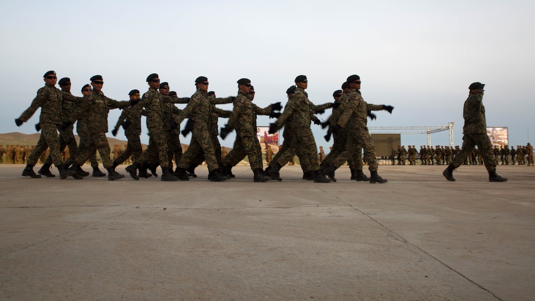 Members of the Malaysian Armed Forces march past reviewing stands during the Khaan Quest 2016 opening ceremonies at Five Hills Training Area, Ulaanbaatar, Mongolia, May 22. Khaan Quest 2016 is an annual multinational peacekeeping operations exercise conducted in Mongolia and is the capstone exercise for the Global Peace Operations Initiative. 