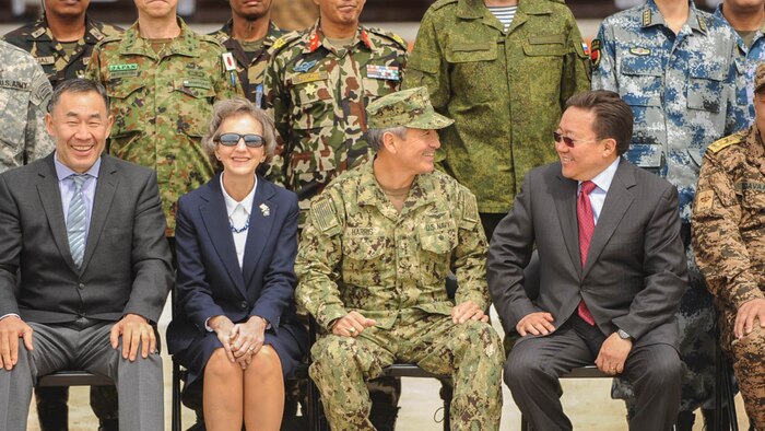 U.S. Pacific Command Commander, Admiral Harry Harris speaks with the President of Mongolia, The Honorable Tsakhiagiin Elbegdorj during the Khan Quest 2016 opening ceremony at Five Hills Training Area, Ulaanbaatar, Mongolia, May 22. Khan Quest 2016 is an annual multinational peacekeeping operations exercise conducted in Mongolia and is the capstone exercise for this year’s Global Peace Operations Initiative program. 