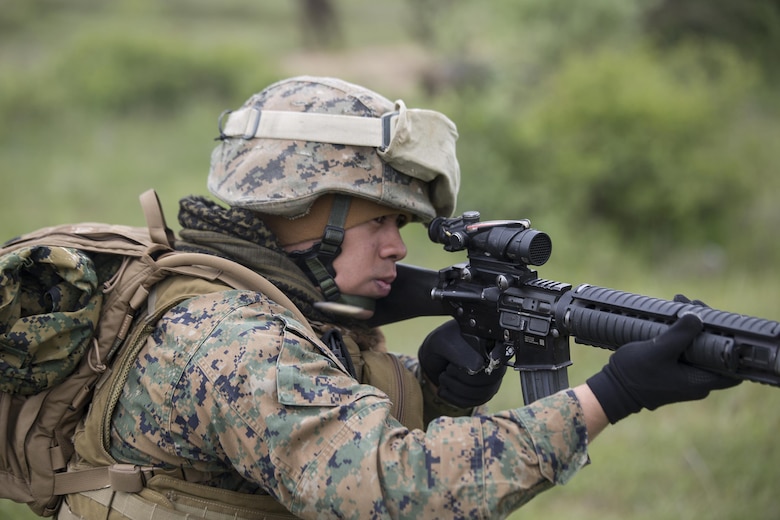 Cpl. Deion Delara, a training noncommissioned officer, with 4th Law Enforcement Battalion, Force Headquarters Group, Marine Forces Reserve, fires at the enemy during exercise Platinum Wolf 2016 at Peacekeeping Operations Training Center South Base, Bujanovac, Serbia, May 16, 2016. The Marines joined partner nations from Bosnia, Bulgaria, Macedonia, Montenegro, Slovenia and Serbia to train in patrolling, cordon and search operations, peacekeeping operations, and non-lethal weapons.