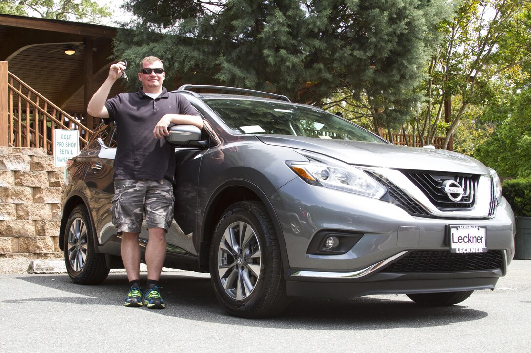 Eric Ferrell won a brand-new Nissan Murano during the 2016 Marine Corps Recruiting Command Spring Golf Tournament at the Medal of Honor Golf Course aboard Marine Corps Base Quantico, Va., May 20, 2016. Ferrell won the vehicle by making a hole-in-one at the hole on which the car was displayed. The tournament is held to raise money for the command’s annual Marine Corps Ball. Ferrell is a family housing technician for Marine Corps Air Station Cherry Point, North Carolina. 