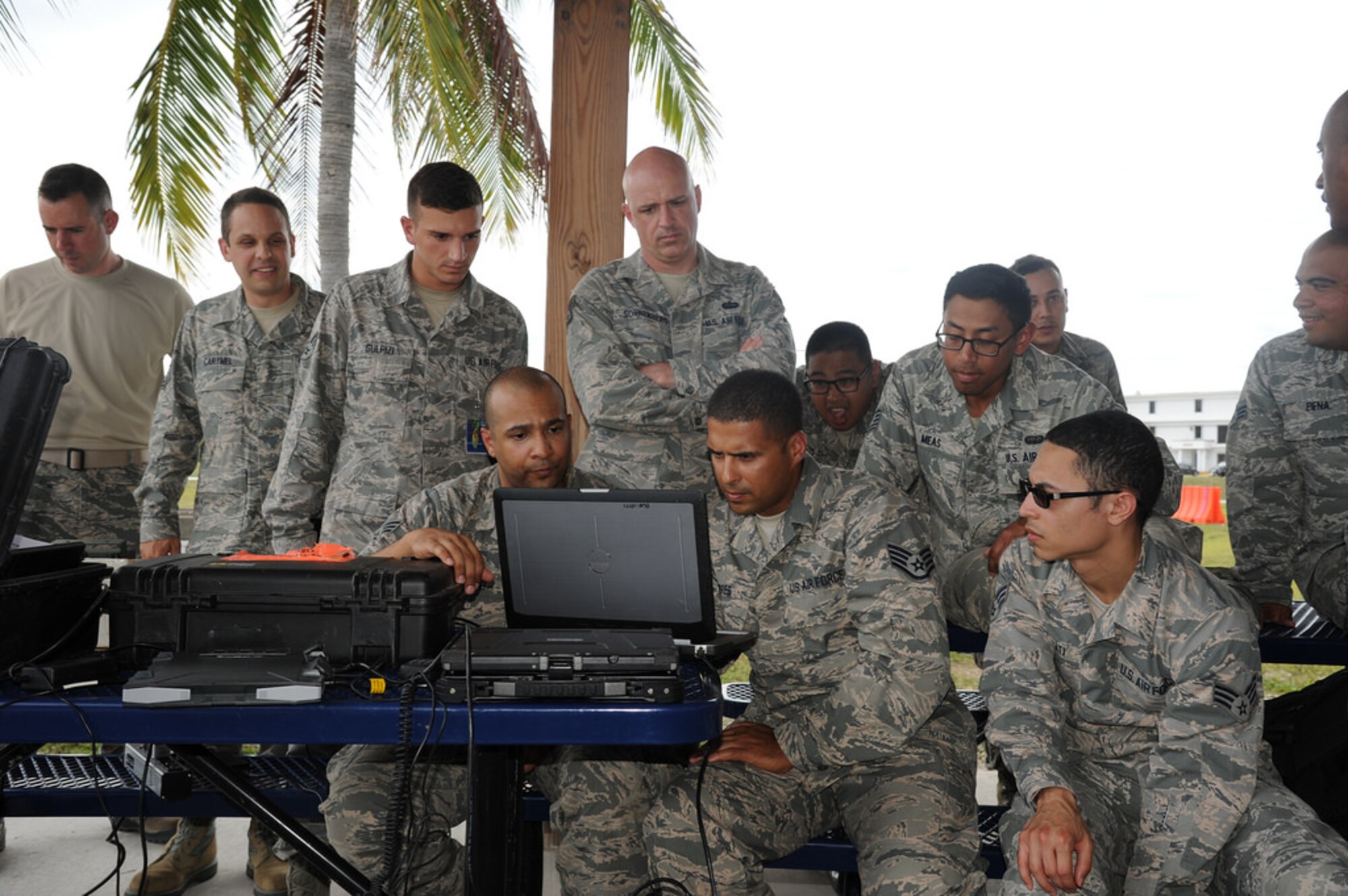 Members working with the 45th Aeromedical Evacuation Squadron work to establish communication during joint exercise Operation Reconnect May 22, 2016 at Key West Naval Air Station, FL. Operation Reconnect was an exercise to test the emergency response capability. (U.S. Air Force photo by Senior Airman Xavier Lockley)