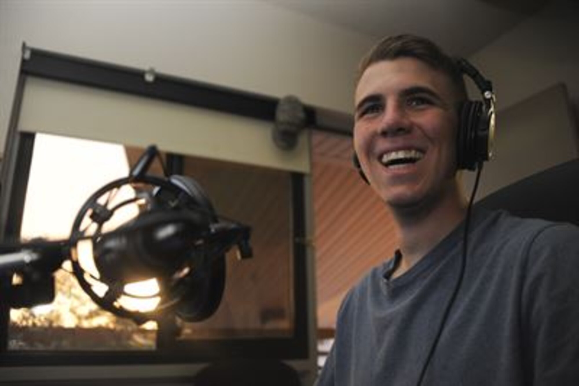 Airman 1st Class Anthony Webb, a 612th Air Communications Squadron command and control systems technician, reads from an online chat room while streaming a video game at Davis-Monthan Air Force Base, Ariz., April 27, 2016. Webb said streaming helped him become more social prior to joining the Air Force. He is now set on building a community by streaming five days a week and holding sessions on Sundays specifically to interact with his followers and get feedback. (U.S. Air Force photo/Airman Nathan H. Barbour)