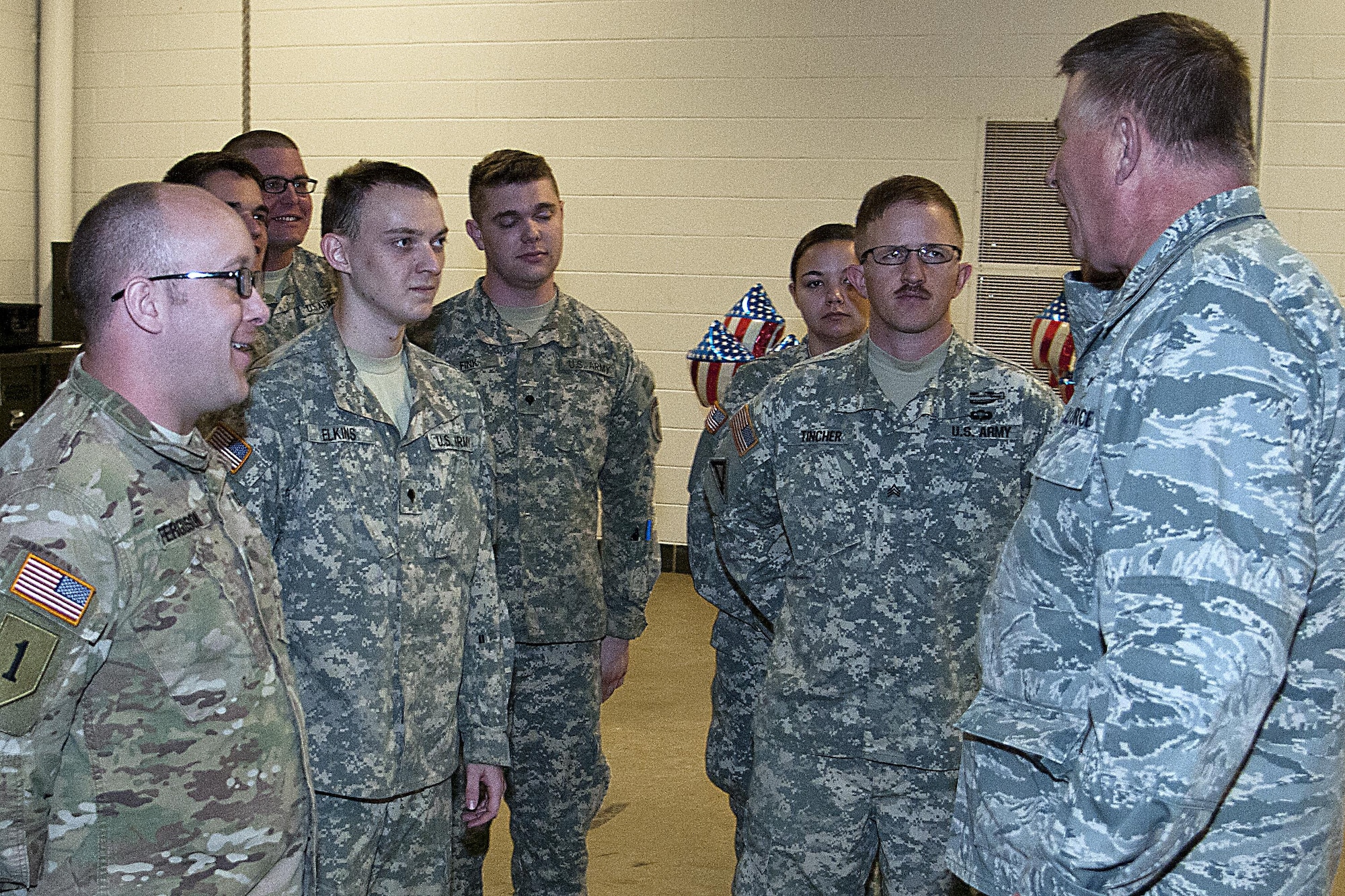 Col. Doug Schwartz, 434th Air Refueling Wing commander, speaks with members of the 316th Psychological Operations Company prior to their deployment May 7, 2016 at Grissom Air Reserve Base, Ind. The soldiers were preparing to go to Africa for several months and Schwartz wanted to wish them well. (U.S. Air Force photo/Senior Airman Dakota Bergl) 