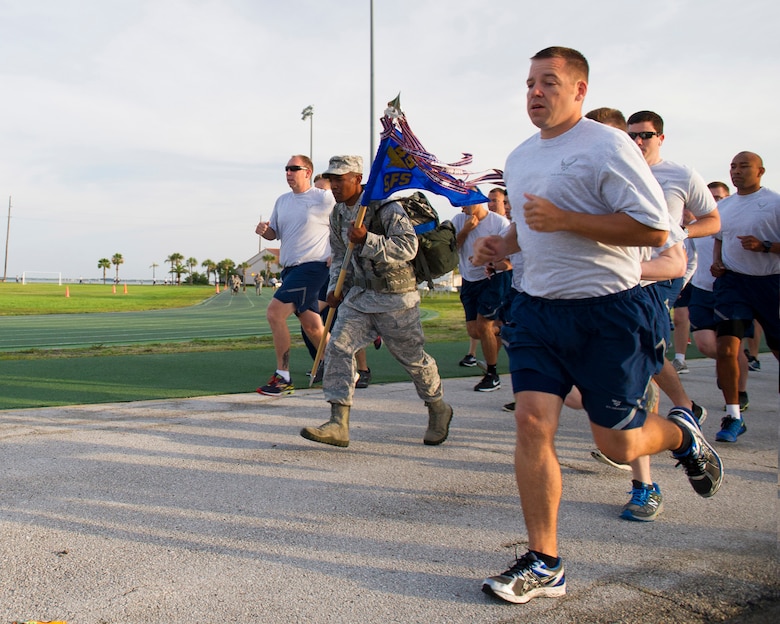 Members of the 45th Space Wing participated in a Quarterly Wing Run lead by the 45th Security Forces Squadron, as part of National Police Week. Participants had three options for this unique Wing Run. Options included: a 5K run in Air Force physical training gear, a 2-Mile Ruck March in ABUs with ruck weight, or a 5K Ruck March in ABUs. (U.S. Air Force photos/Matthew Jurgens/Released)