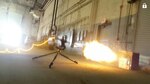A charge ignites a remotely fired shotgun-like device which blasts a suspected bomb during the Raven's Challenge at the New York State Preparedness Training Center in Oriskany New York, on Wecdnesday,  May 18.