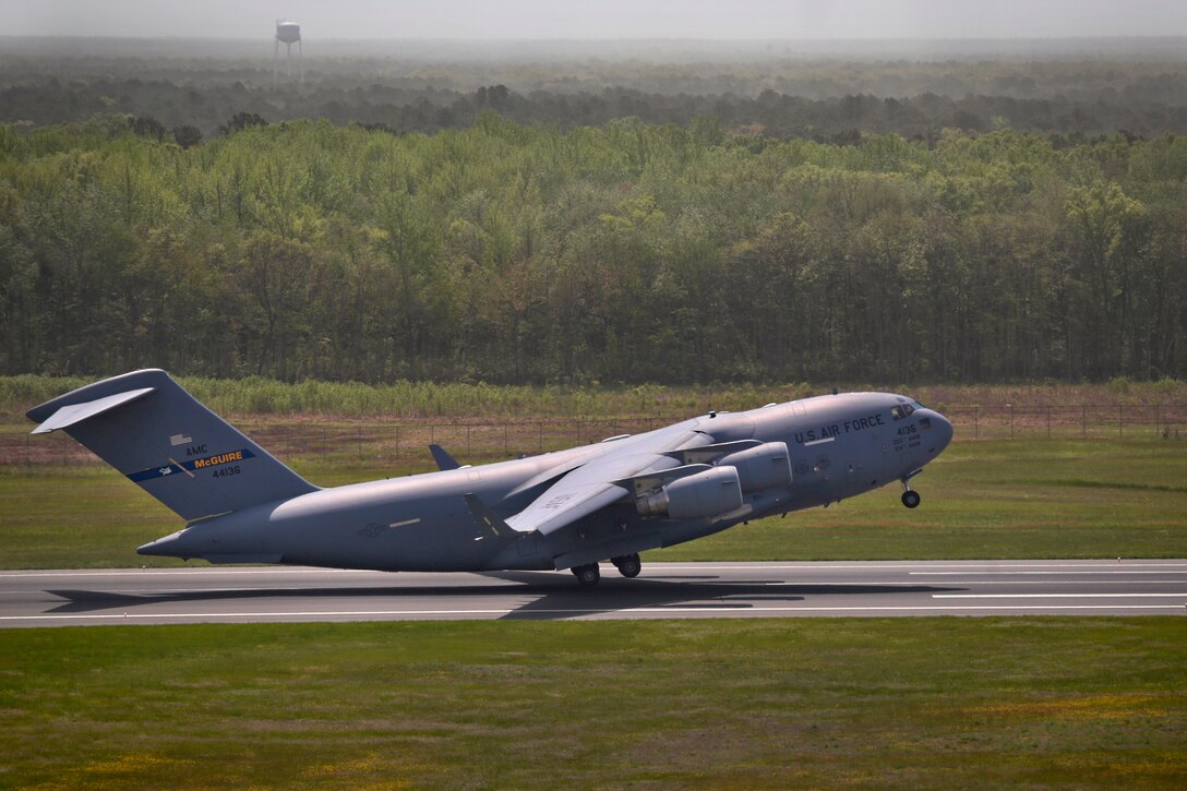 An Air Force C-17 Globemaster III takes off during the Power in the Pines Open House and Air Show at Joint Base McGuire-Dix-Lakehurst, N.J., May 14, 2016. As the nation’s only tri-service joint base, this event highlights demonstrations from each branch of the armed forces. Air National Guard photo by Tech. Sgt. Matt Hecht