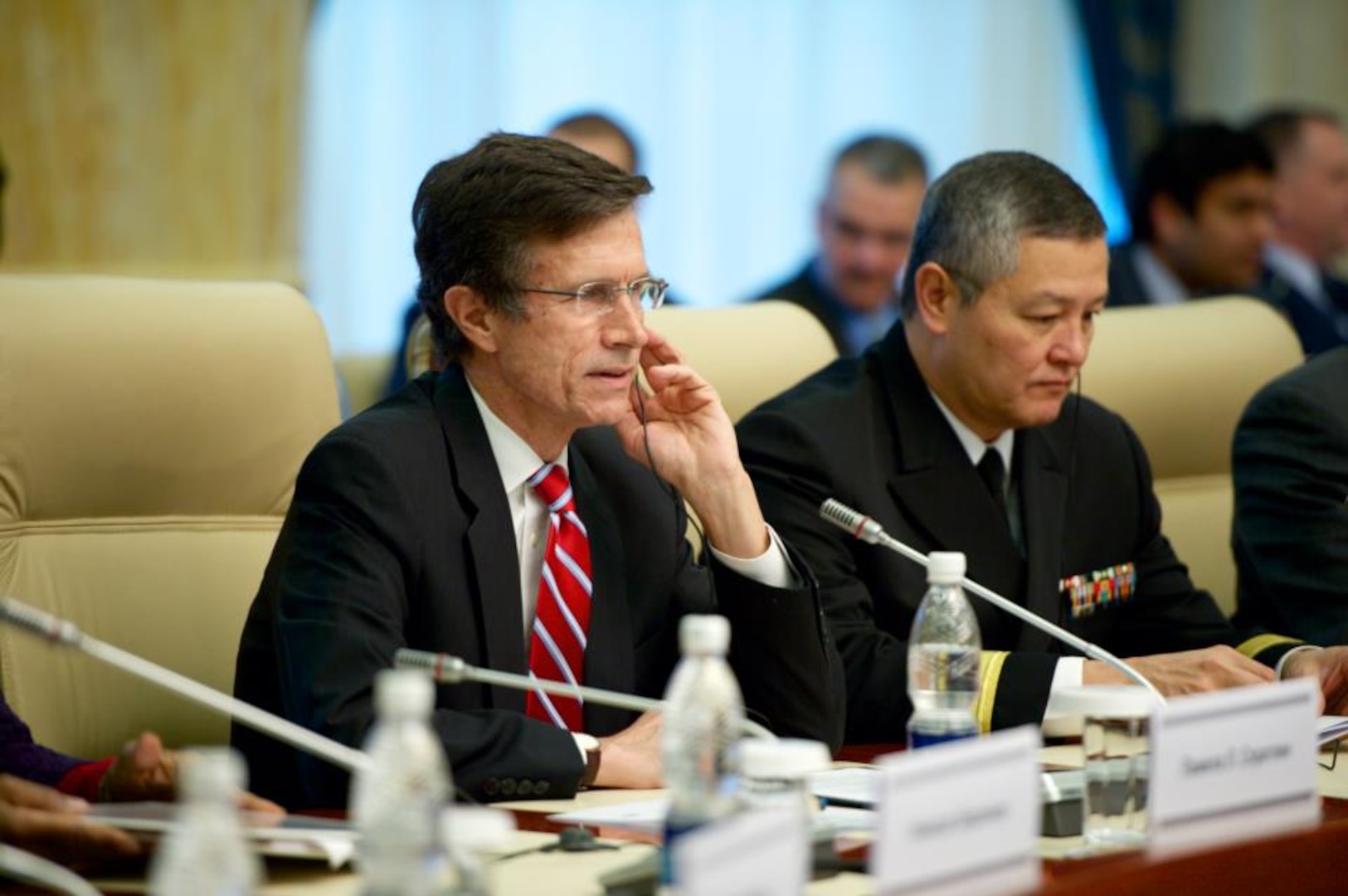 Rear Adm. Ron. J. MacLaren (right) and Asst. Sec. of State Robert Blake Jr. listen to the Kyrgyz delegation's remarks at the Annual Bilateral Consultation between the U.S. and Kyrgyzstan in Bishkek, January 2012. MacLaren was there to discuss local procurement efforts of the Defense Logistics Agency and other U.S. government agencies in Kyrgyzstan in support of U.S. troops in Afghanistan. 