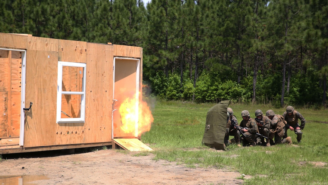 Marines with 2nd Combat Engineer Battalion detonate a charge while formed up in their stack during breaching operations at Marine Corps Base Camp Lejeune, North Carolina, May 19, 2016. The unit built, placed, and detonated charges to practice gaining entry and clearing an enemy-occupied building in preparation for an upcoming deployment.